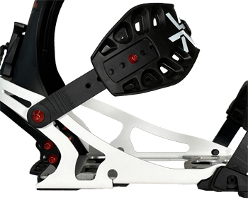 Close-up of white snowboard binding with black highback and red bolts