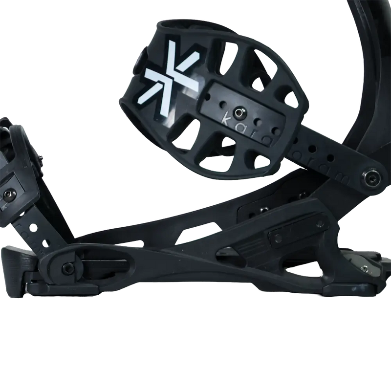 Black snowboard binding with ankle strap and buckle, side view