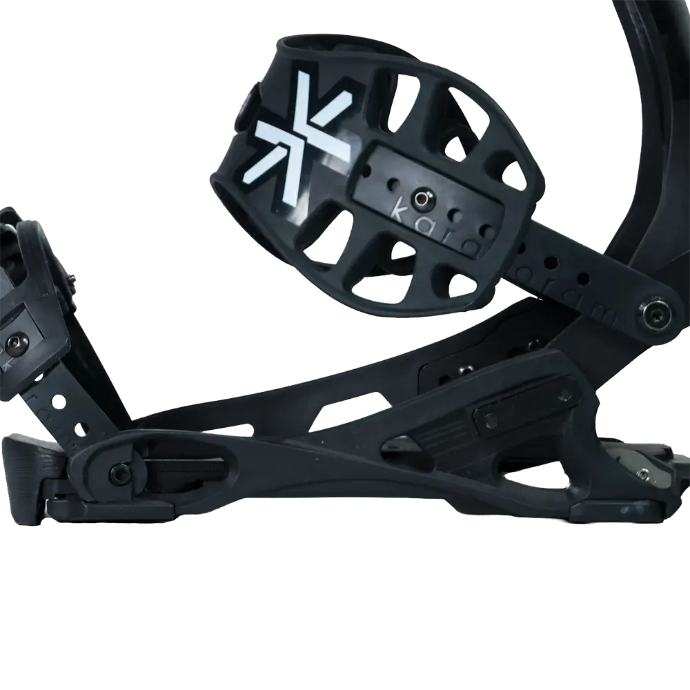 Black snowboard binding with ankle strap and buckle, side view