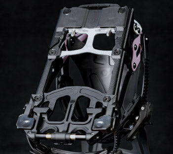 Black backpack frame with adjustable straps and hardware, close-up view