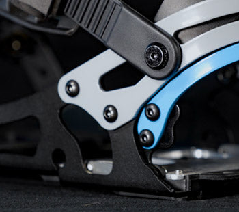 Close-up of ski touring binding heel piece with blue metal lever