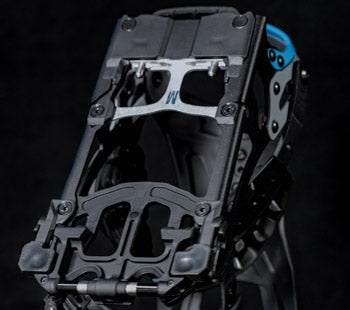 Black snowboard binding baseplate with blue heel strap, close-up angle