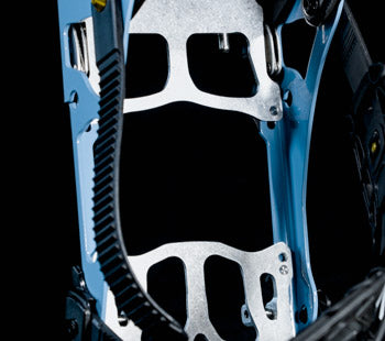 Close-up of bicycle frame interior with belt drive and blue metal parts
