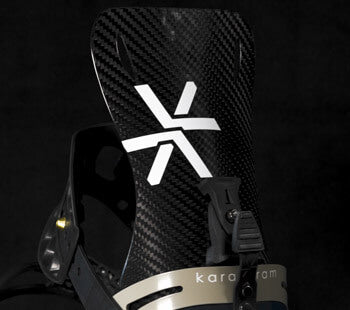 Black carbon fiber snowboard binding highback with white X logo