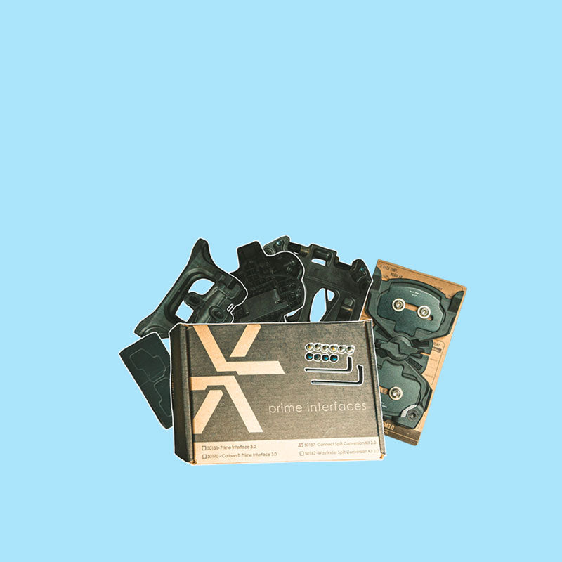 Black plastic binding interface parts with cardboard "Prime Interfaces" packaging box