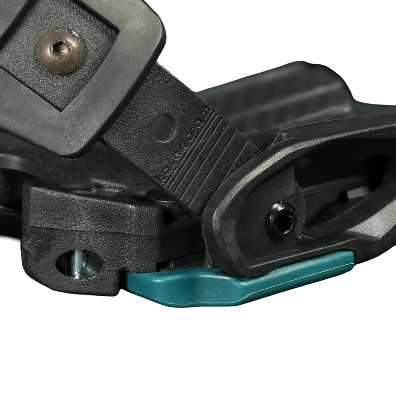 Close-up of black snowboard binding hinge with teal release lever
