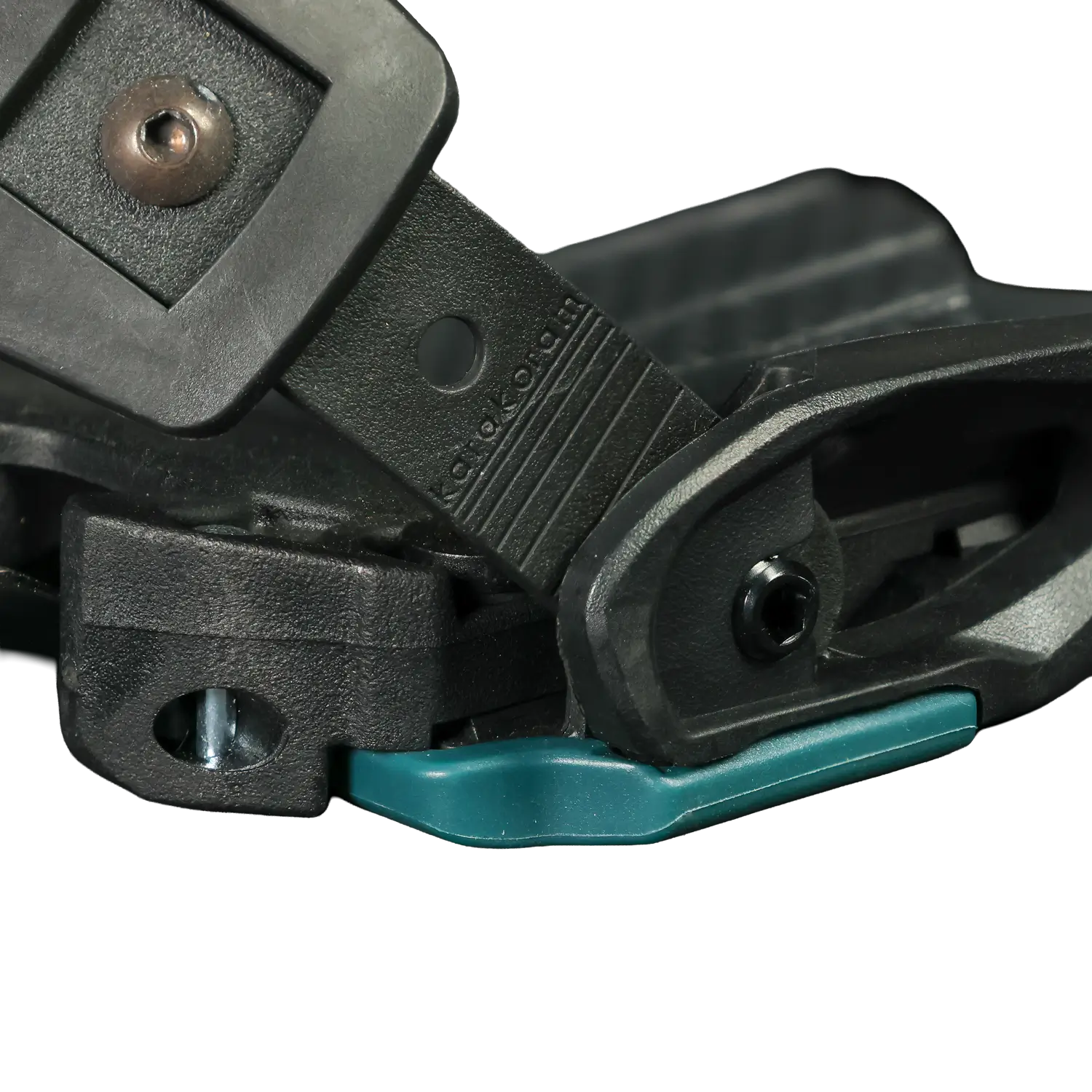 Close-up of black snowboard binding hinge with teal release lever