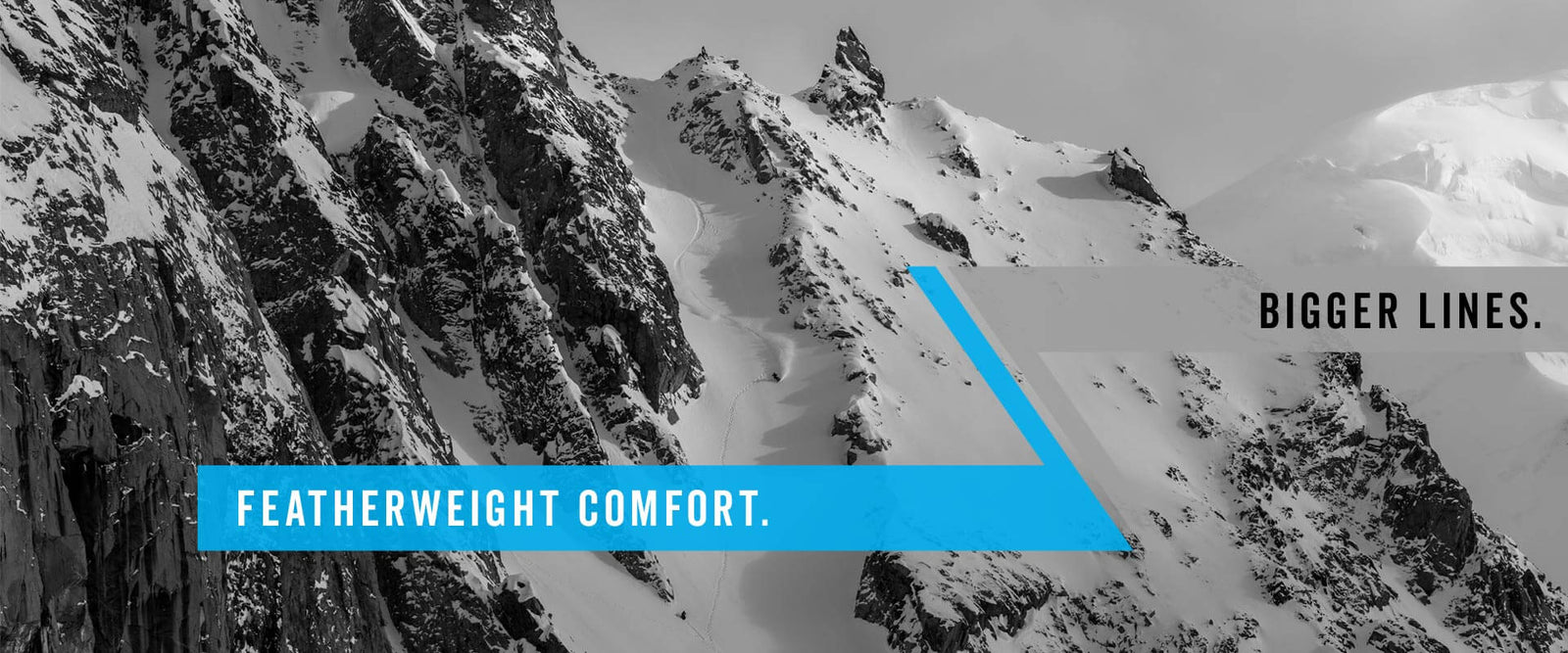 Black-and-white snowy mountain ridge with ski tracks, blue banner overlay