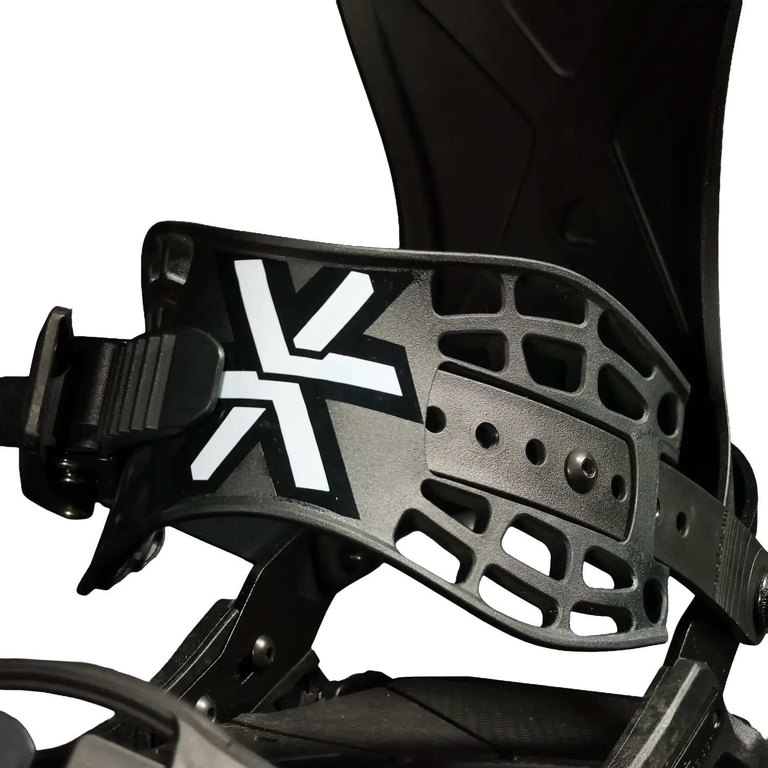 Close-up of black snowboard binding with white X logo and ratchet buckle